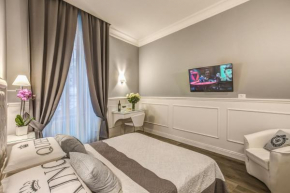 Отель Romanov Suites - Piazza di Spagna  Рим